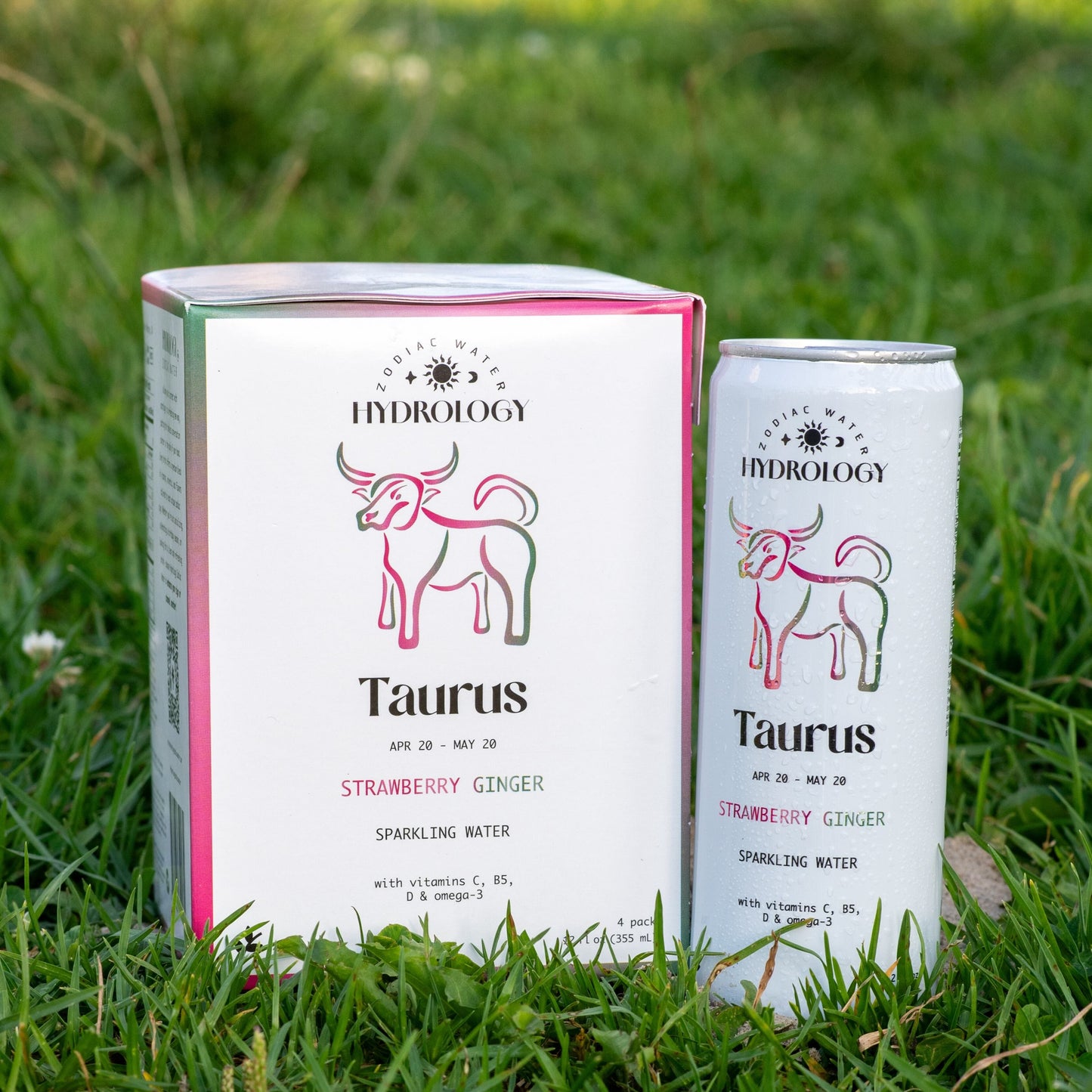 Taurus astrology themed beverage 4-pack and can in grass